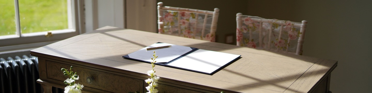 Image of a desk used for the signing of the register